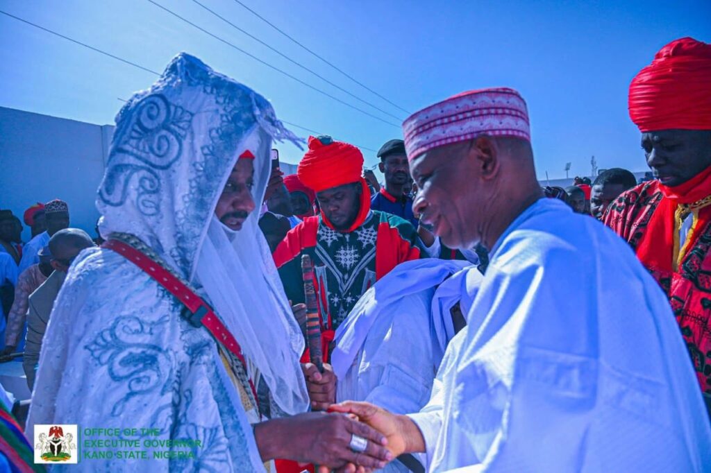 Abba Kabir Yusuf and Emir of Kano Shaking hands Abba Kabir Yusuf and Emir of Kano Shaking hands