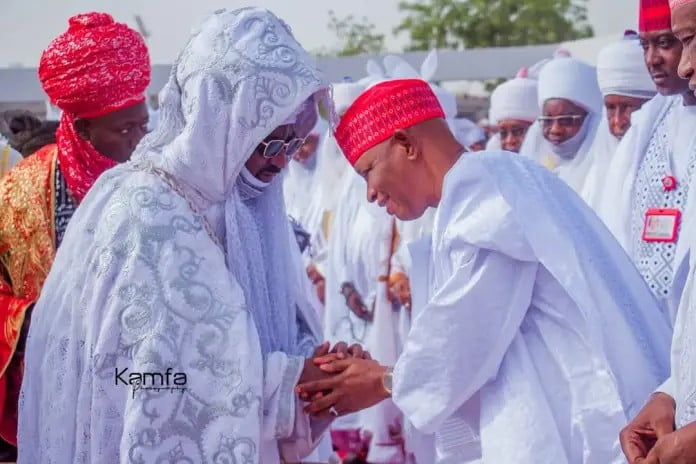 Emir and Gov Shaking hands