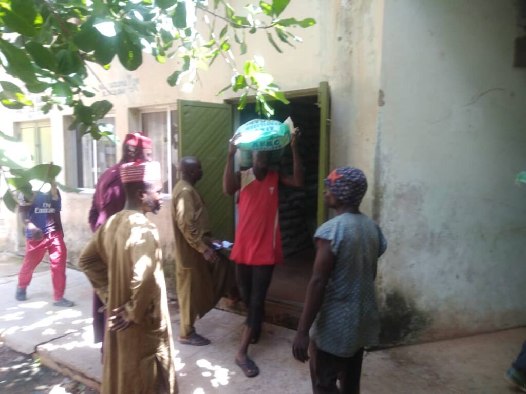 Farmer Carrying Fertiliser