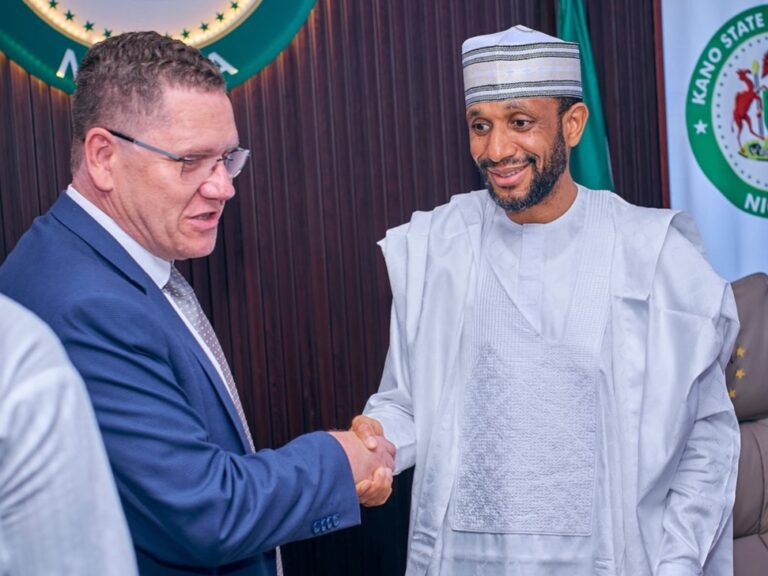 KNSG Seeks Stronger EU Partnership on critical sectors Murtala Shaking hands with the EU representative